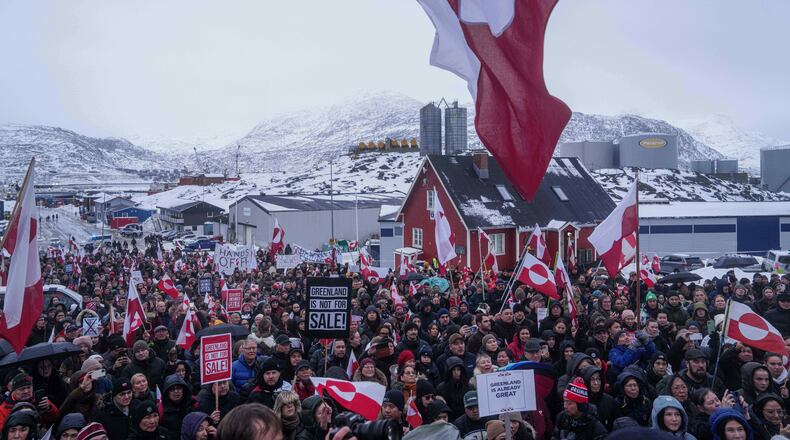 FILE - People protest against Trump's policy towards Greenland in front of the US consulate in Nuuk, Greenland, Jan. 17, 2026. (AP Photo/Evgeniy Maloletka, File)