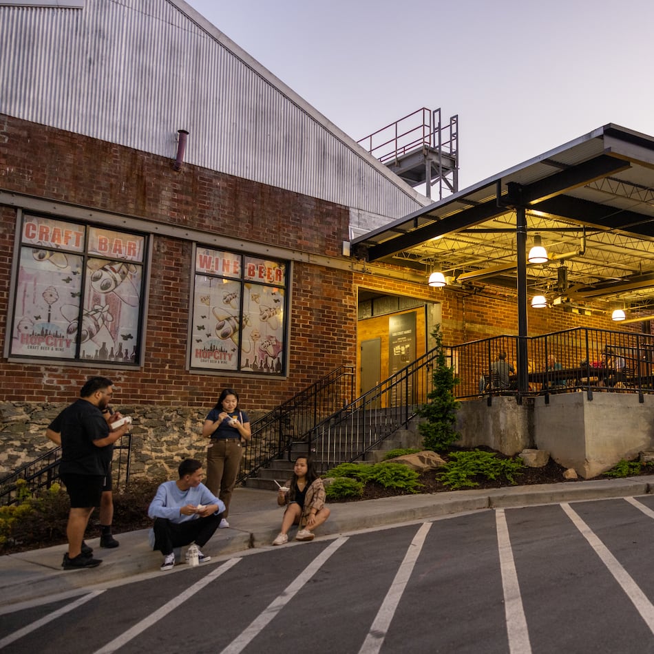 People enjoy dessert in front of Krog Street Market, Sept. 17, 2022. (Brandon McKeown/Access Atlanta)