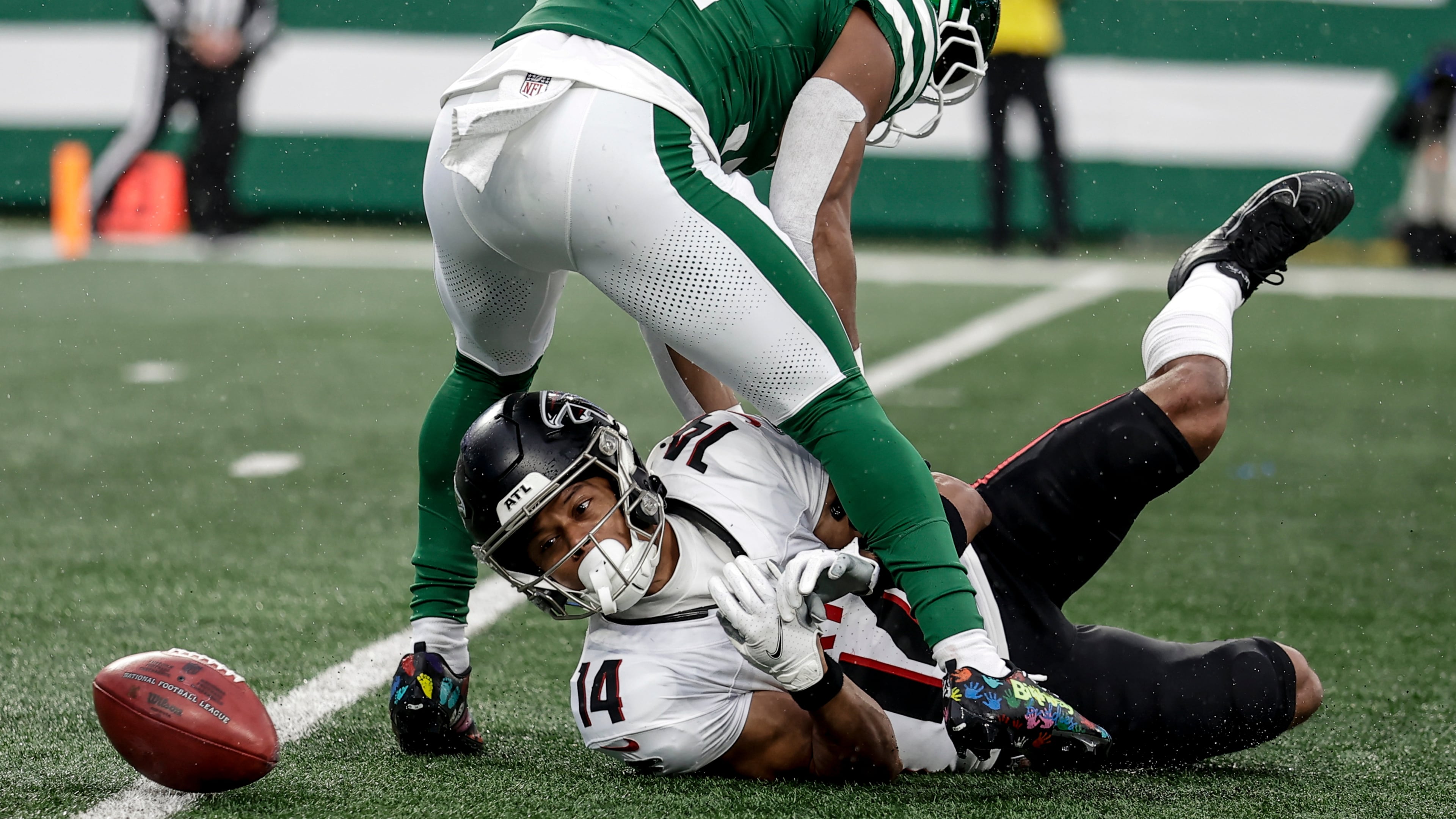 Atlanta Falcons wide receiver Jamal Agnew muffed a punt that he probably should not have attempted to catch in the first place, a play that led directly to a New York Jets touchdown. (Adam Hunger/AP)