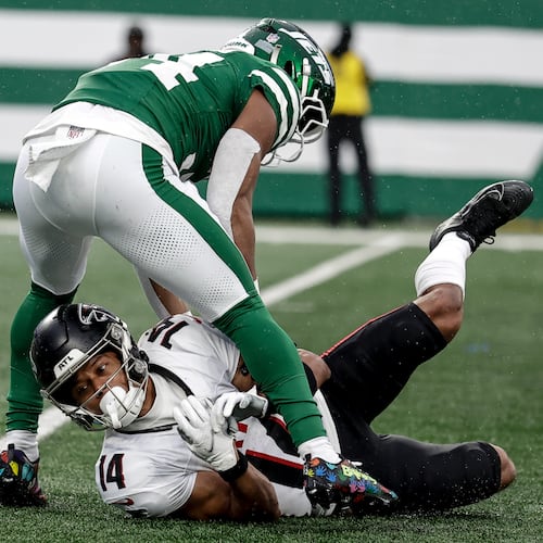Atlanta Falcons wide receiver Jamal Agnew muffed a punt that he probably should not have attempted to catch in the first place, a play that led directly to a New York Jets touchdown. (Adam Hunger/AP)