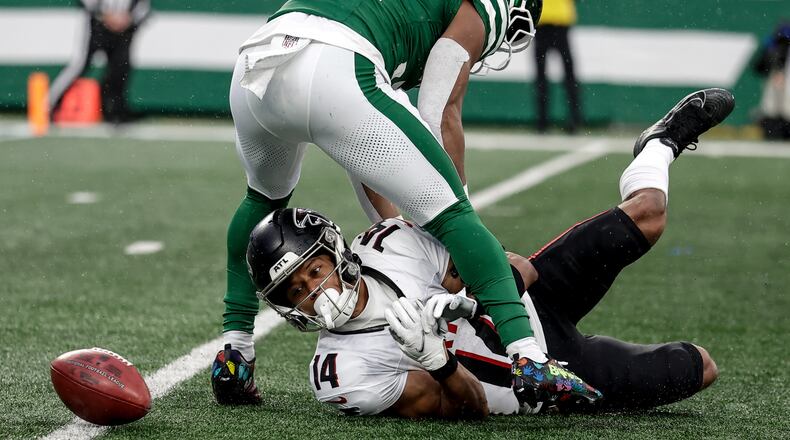 Atlanta Falcons wide receiver Jamal Agnew muffed a punt that he probably should not have attempted to catch in the first place, a play that led directly to a New York Jets touchdown. (Adam Hunger/AP)