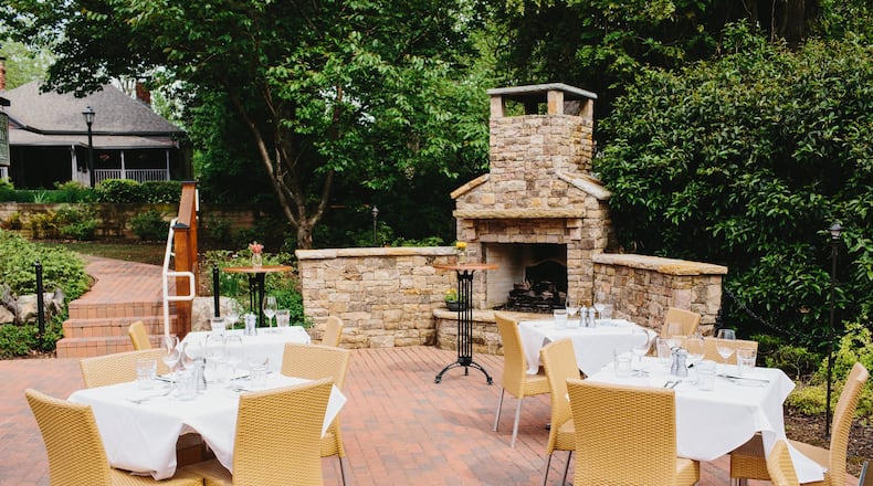 Table & Main is a cozy restored homestead complete with an outdoor fireplace on lively Canton Street in Roswell. CONTRIBUTED BY TABLE & MAIN