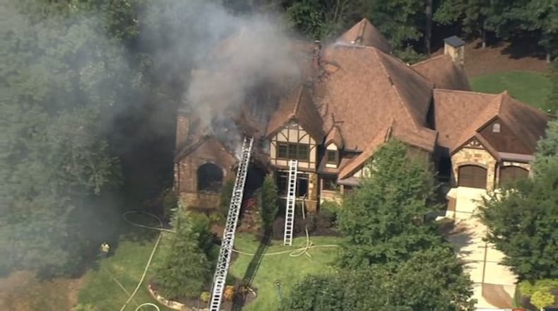 Crews battling large house fire in Gwinnett County.