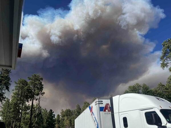 This photo provided by Abraham Freebairn shows wildfire smoke near the Grand Canyon's North Rim, in northern Arizona, on Thursday, July 10, 2025. (Abraham Freebairn via AP)