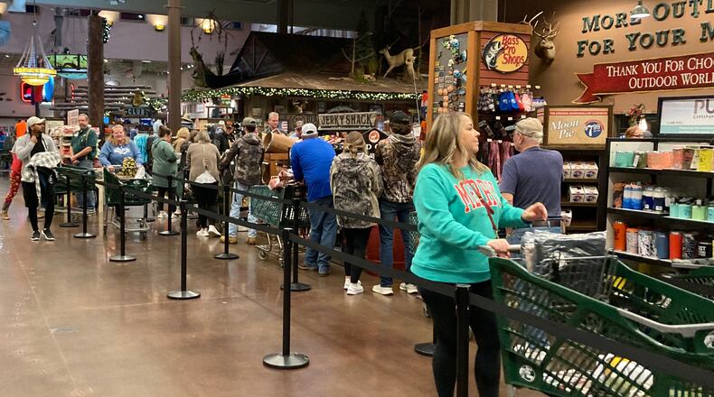 FILE: Shoppers at the Bass Pro Shops at Sugarloaf Mills in Lawrenceville, Ga.
