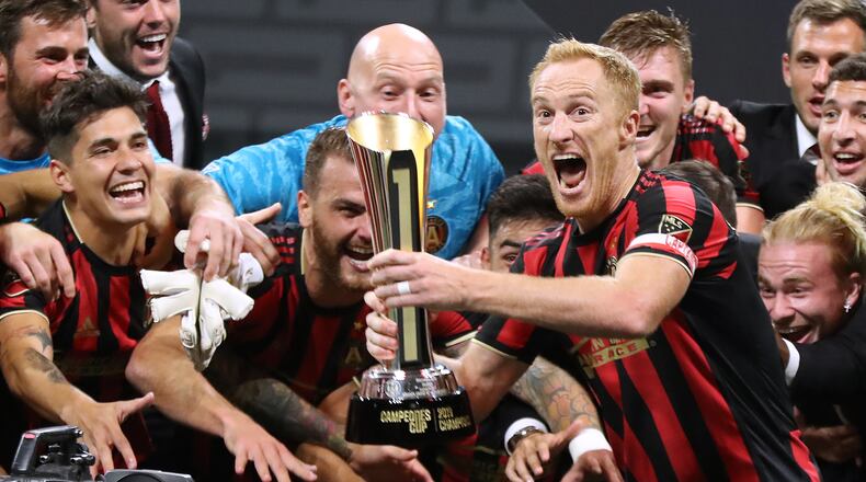**** VISUAL LEDE **** August 14, 2019 Atlanta: Atlanta United captain Jeff Larentowicz hoists the trophy for the team to celebrate a 3-2 victory over Club America to win the Campeones Cup on Wednesday, August 14, 2019, in Atlanta.   Curtis Compton/ccompton@ajc.com