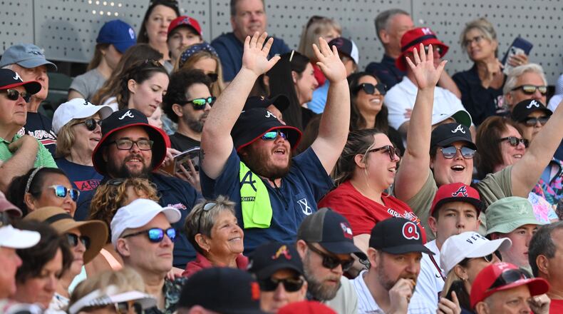 Atlanta Braves fans cheer during the home opener spring training baseball game against Boston Red Sox at CoolToday Park, Sunday, Feb. 25, 2024, in North Port, Florida. (Hyosub Shin / Hyosub.Shin@ajc.com)