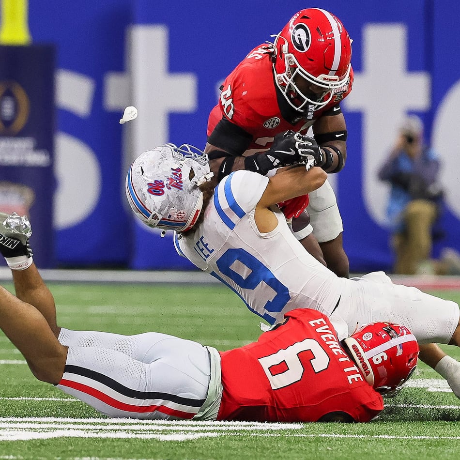 Ole Miss earned the SEC $14 million for its College Football Playoff appearances, and Georgia raked in $8 million for the conference. (Jason Getz/AJC)