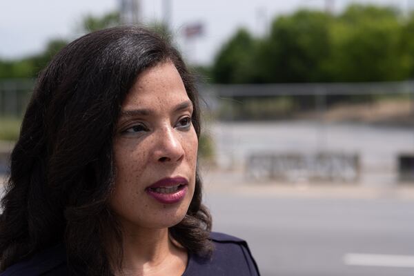 Kimberlee Jones on June 3, 2021, in Atlanta, in front of the vacant lot that's the site of a former Wendy's where Rayshard Brooks was killed. “There are so many great people who live in this neighborhood,” Jones said. “People who are committed to the neighborhood. But for some reason, the city just refused to see us. It is very typical of how racism can play a role in how a neighborhood can be allowed to deteriorate.” (Ben Gray for the Atlanta Journal-Constitution)

