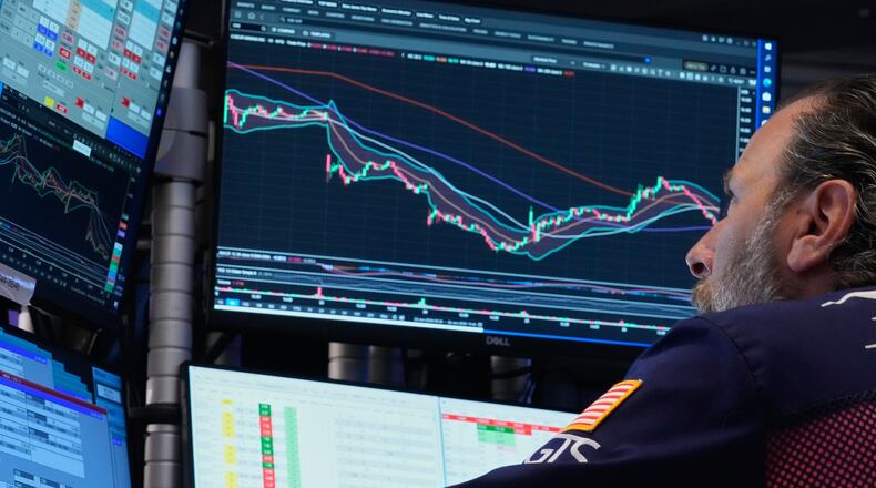 Specialist Michael Pistillo works on the floor of the New York Stock Exchange, Friday, June 26, 2026. (AP Photo/Richard Drew)