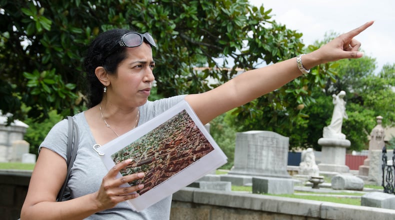 A guide points out the sites in the Grant Park Past & Future Food Walk Tours. 
Courtesy of Atlanta Food Walks.