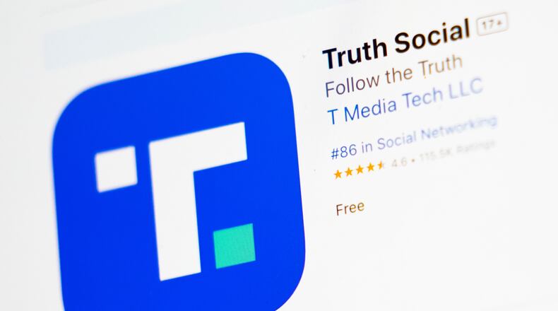 FILE - The download screen for the Truth Social app is displayed on a laptop computer, March 20, 2024, in New York. (AP Photo/John Minchillo, File)