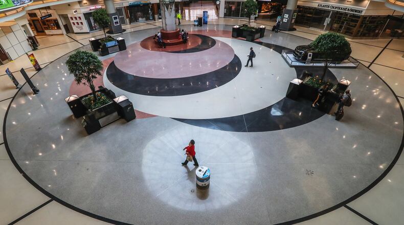 A nearly empty Hartsfield-Jackson International Airport on Thursday April 9, 2020. A data analysis by The Atlanta Journal-Constitution found that air traffic in and out of Hartsfield-Jackson International Airport — the world’s busiest — remained at 2019 levels well into the first weeks of March as the airline industry kept assuring the public air travel was safe. (JOHN SPINK/JSPINK@AJC.COM)