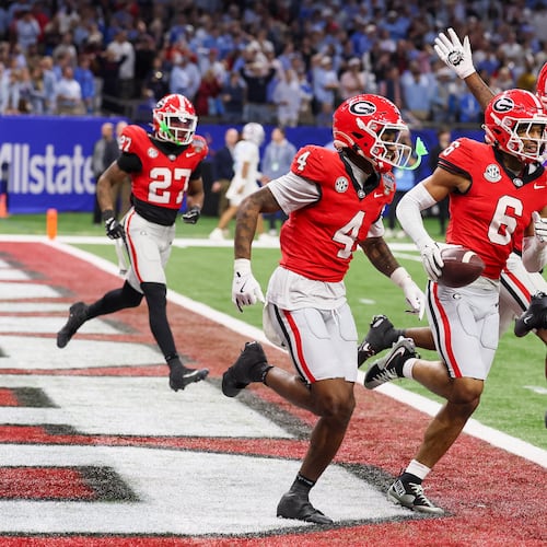 Georgia Bulldogs defensive back Daylen Everette celebrates a fumble recovery for a 47 yard touchdown against the Ole Miss Rebels during the second quarter of the College Football Playoff quarterfinal game at the Sugar Bowl in the Caesars Superdome, Thursday, Jan. 1, 2026, in New Orleans. (Jason Getz/AJC)