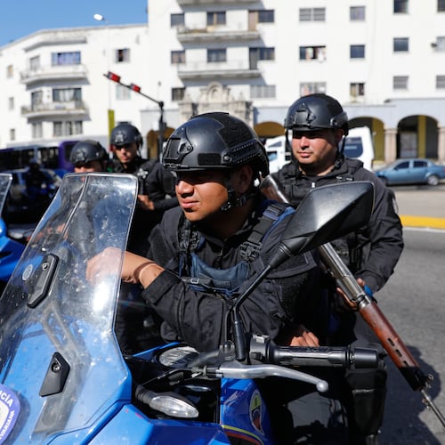 Police patrol in downtown Caracas, Venezuela, Monday, Jan. 5, 2026. (AP Photo/Cristian Hernandez)