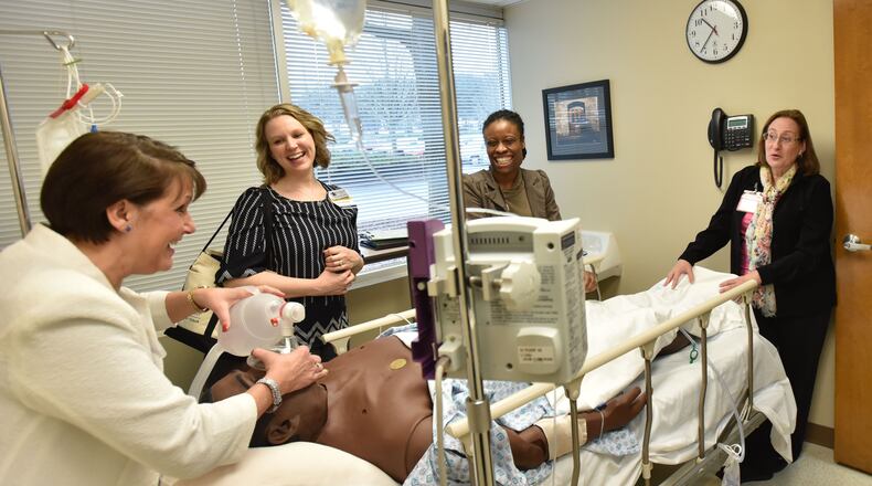Scores of Gwinnett County teachers, pictured here, shadowed people in other professions in February to get a better sense of how they do their jobs in order to do a better job teaching students skills employers say they’re looking for once they graduate. Gwinnett is working on a new teacher compensation plan. HYOSUB SHIN / HSHIN@AJC.COM