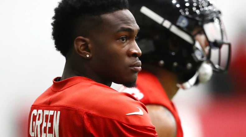 Injured Atlanta Falcons seventh round draft pick running back Marcus Green, who has a hamstring, watches over rookie minicamp practice Saturday, May 11, 2019, in Flowery Branch.