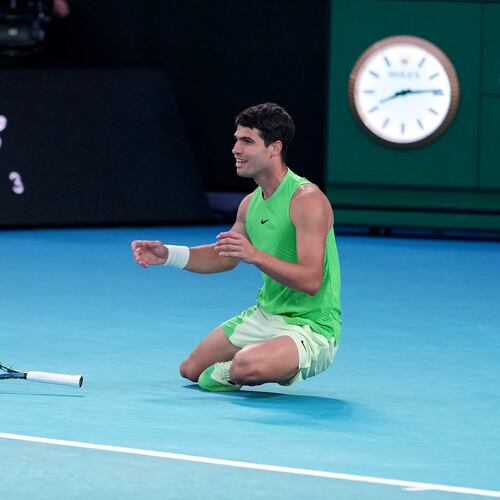 Carlos Alcaraz of Spain celebrates after defeating Alexander Zverev of Germany in their semifinal match at the Australian Open tennis championship in Melbourne, Australia, Friday, Jan. 30, 2026. (AP Photo/Asanka Brendon Ratnayake)