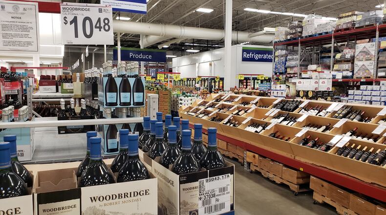 Alcohol sales in Georgia were at a 12-year high in July, just as COVID-19 cases peaked in Georgia. Alcohol supplies have had no trouble keeping up with demand, as evidenced by full shelves at a Sam's Club in DeKalb County. (George Mathis/gmathis@ajc.com)