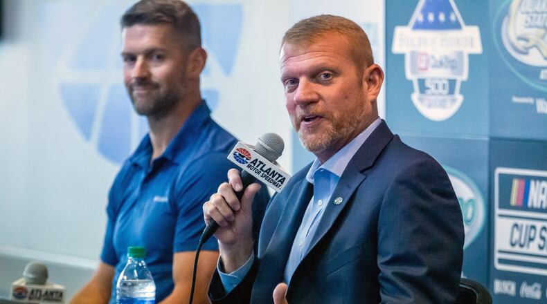 Brandon Hutchison (R) sits next to Steve Swift during a press conference at Atlanta Motor Speedway in  Hampton Tuesday, July 6, 2021.  (STEVE SCHAEFER/The Atlanta Journal-Constitution)