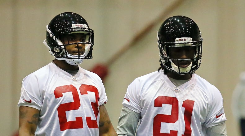 050413 FLOWERY BRANCH: -- TOP TWO PICKS -- Falcons rookie cornerbacks Desmond Trufant (right), selected in the first round with the number 22 pick overall, and Robert Alford, selected in the second round, run through drills during rookie minicamp on Saturday, May 4, 2013, in Flowery Branch. CURTIS COMPTON / CCOMPTON@AJC.COM