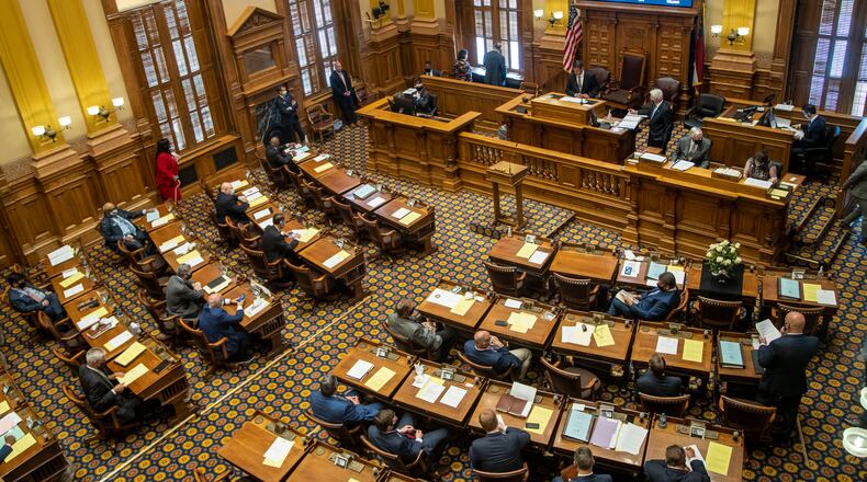 06/15/2020 - Atlanta , Georgia - Senators gather in the Senate chambers on the 30th day of the legislative session at the Georgia State Capitol building in Atlanta, Monday, June 15, 2020. The legislative session returned on Monday following a break due to COVID-19. (ALYSSA POINTER / ALYSSA.POINTER@AJC.COM)