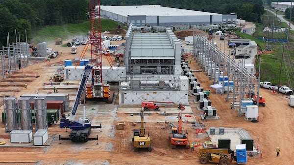 An aerial view shows off-grid generators being installed in front of a data center in Covington. (Hyosub Shin/AJC)