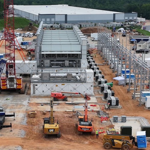 An aerial view shows off-grid generators being installed in front of a data center in Covington. (Hyosub Shin/AJC)