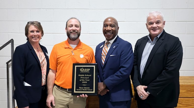 Ryan Queen, principal of Gwinnett County's Trickum Middle School, received the Principal of the Year award from the Georgia Association of Secondary School Principals. (Courtesy of Gwinnett County Public Schools)