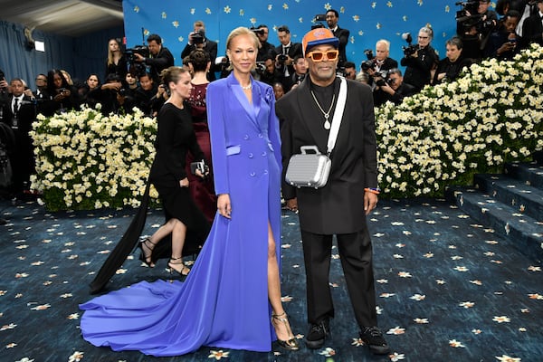 Tonya Lewis Lee, left, and Spike Lee attend The Metropolitan Museum of Art's Costume Institute benefit gala celebrating the opening of the "Superfine: Tailoring Black Style" exhibition on Monday, May 5, 2025, in New York. (Photo by Evan Agostini/Invision/AP)