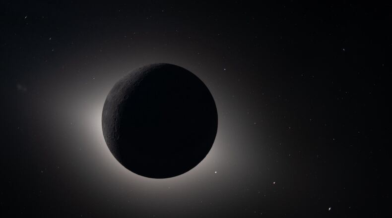 FILE - This image provided by NASA and captured by the Artemis II crew from lunar orbit, April 6, 2026, shows the Moon eclipsing the Sun. (NASA via AP, File)