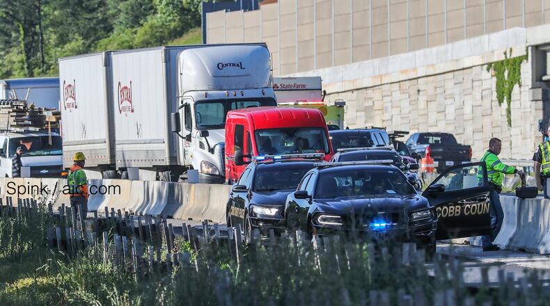 Cobb County police shut down the northbound lanes of I-75 south of Barrett Parkway while they investigated a fatal crash.