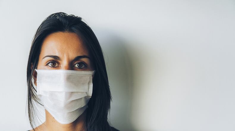 Do face masks work at preventing COVID-19 transmission? Not unless we wear them. (Dreamstime/TNS)