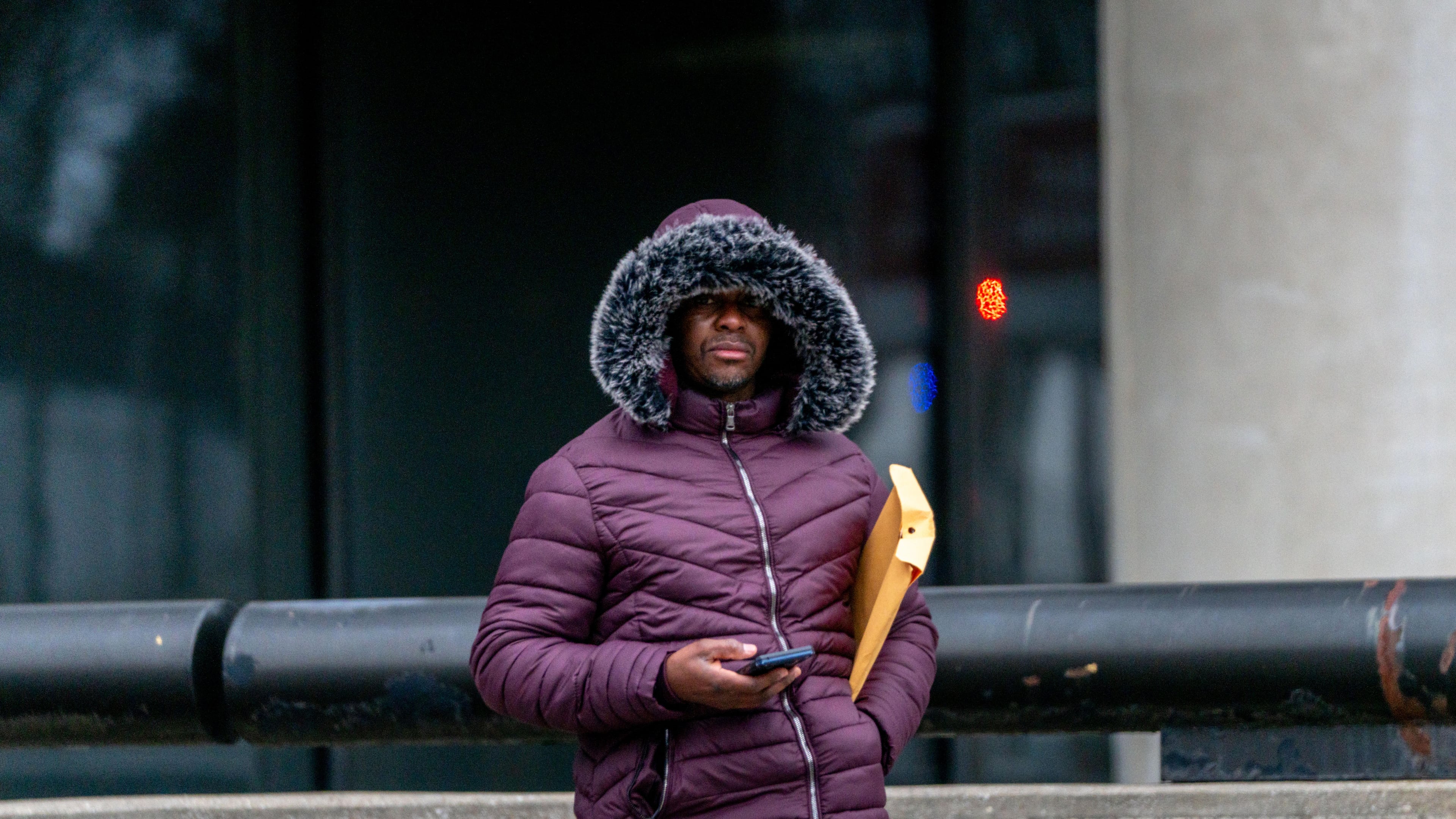 An Atlanta commuter bundles up amid extreme cold earlier this year. Freezing temperatures are expected to make a comeback Monday and Tuesday. (Ben Hendren for the AJC file)