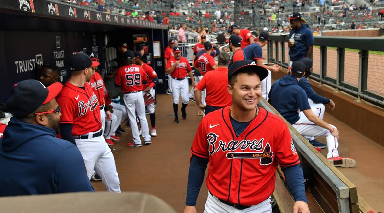 Braves outfielder Joc Pederson smiles in the dugout in the first inning at Truist Park on Friday, July 16, 2021. (Hyosub Shin / Hyosub.Shin@ajc.com)