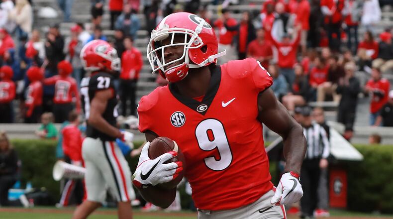 Jeremiah Holloman’s dismissal leaves Georgia without its top five pass catchers from last season