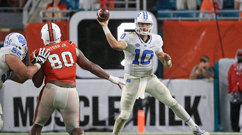 Mitch Trubisky #10 of the North Carolina Tar Heels passes during a game against the Miami Hurricanes at Hard Rock Stadium on October 15, 2016 in Miami Gardens, Florida. (Photo by Mike Ehrmann/Getty Images)