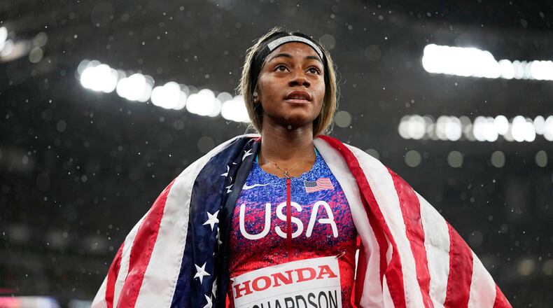 FILE - United States' Sha'Carri Richardson looks on after winning the gold medal in the women's 4 X 100 meters relay at the World Athletics Championships in Tokyo, Sept. 21, 2025. (AP Photo/Matthias Schrader, File)