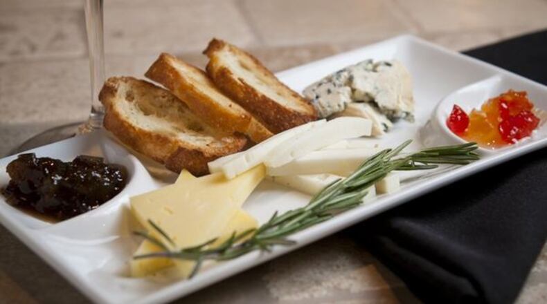 Photo credit: Vine & Tap cheese and charcuterie plate. Photo Credit: Heather Photographers