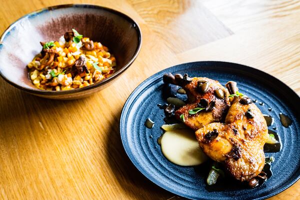 Vegetarian Spaetzle (left) and Slow-roasted Chicken Legs at Redbird. CONTRIBUTED BY HENRI HOLLIS