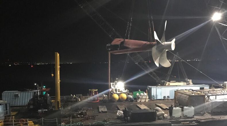 Crews transfer the propeller from the M/V Golden Ray to the work barges for safe removal, St. Simons Sound, Dec. 20, 2019.