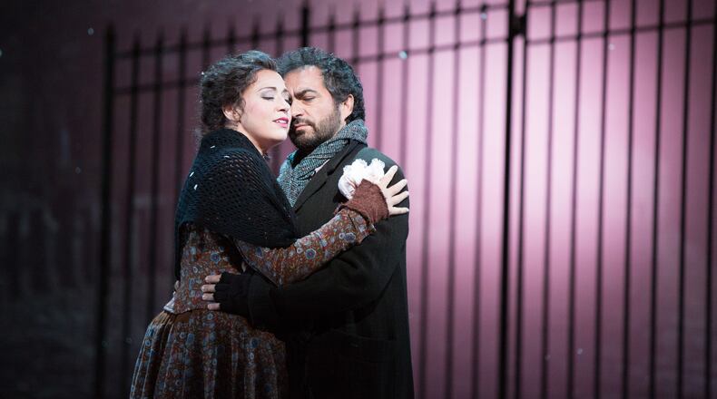 Atlanta Opera's 2024 production of Giacomo Puccini's "La Bohème" will probably resemble this 2015 staging, which featured Maria Luigia Borsi as Mimi and Gianluca Terranova as Rodolfo, in the lover’s duet. Courtesy of Jeff Roffman