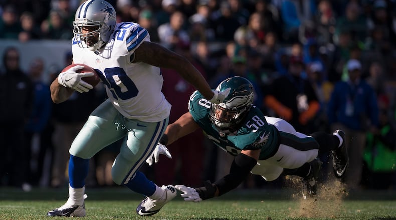 The likely pending suspension of Cowboys running back Ezekiel Elliott make bring backup Darren McFadden back into the light. He's seen here running past Jordan Hicks of the Eagles in an January 1 game at Lincoln Financial Field in Philadelphia, Pa.