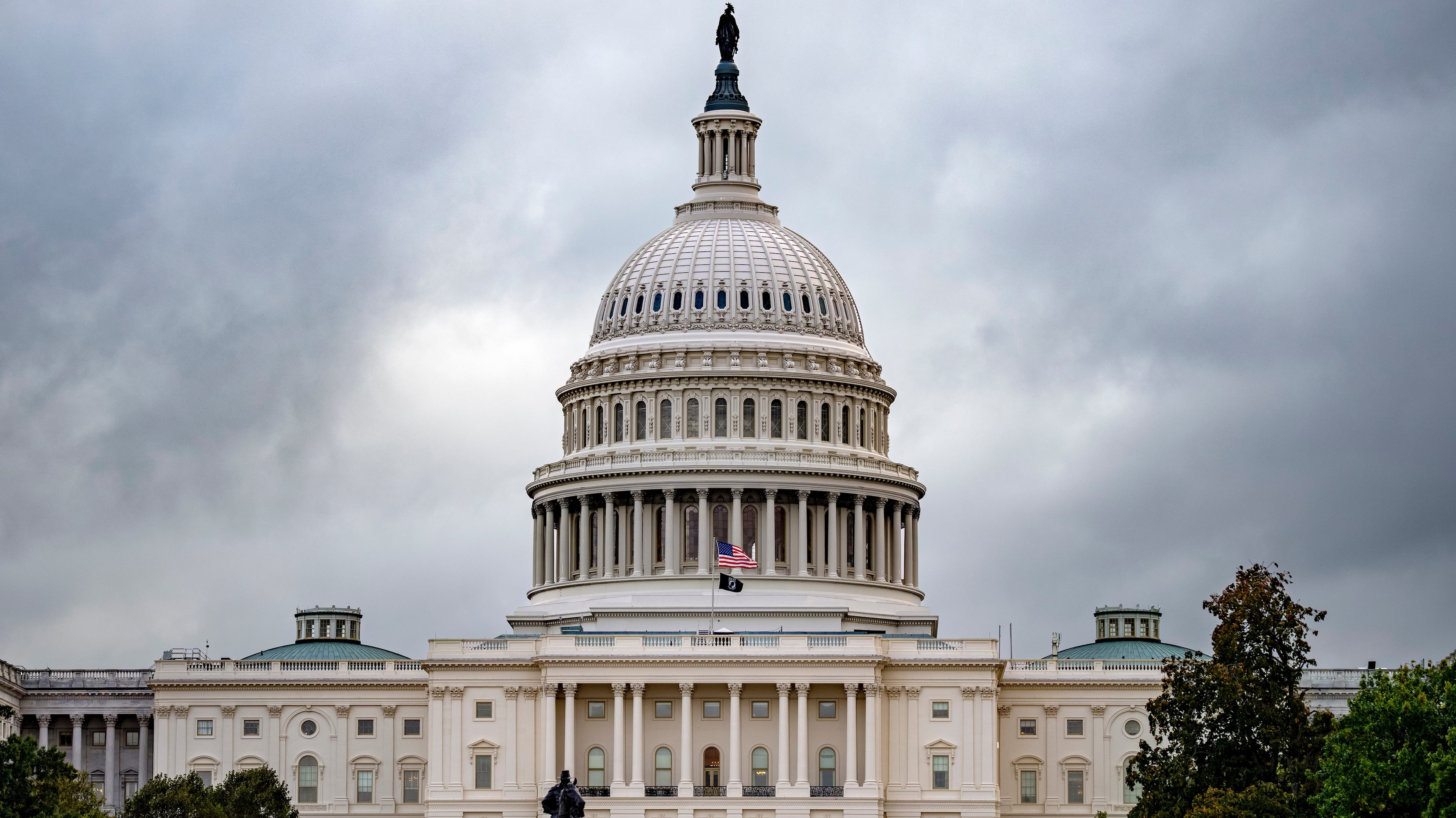The Capitol is seen under gray skies on the thirteenth day of the government shutdown, in Washington, Monday, Oct. 13, 2025. (AP Photo/J. Scott Applewhite)