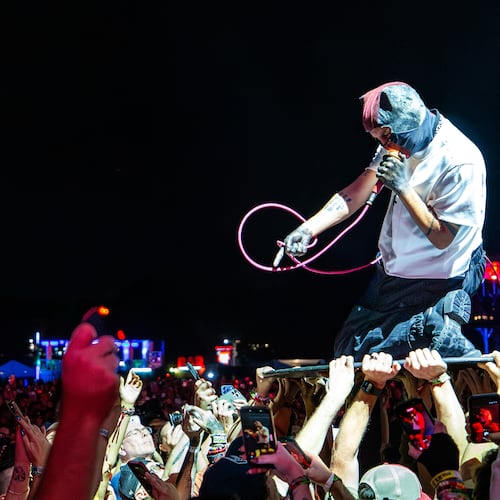 After a lengthy rain delay and evacuation, 21 Pilots closed out Saturday night at Shaky Knees with genre bending hits on the Peachtree Stage on Sept. 19, 2026, in Atlanta. (Ryan Fleisher for the AJC)