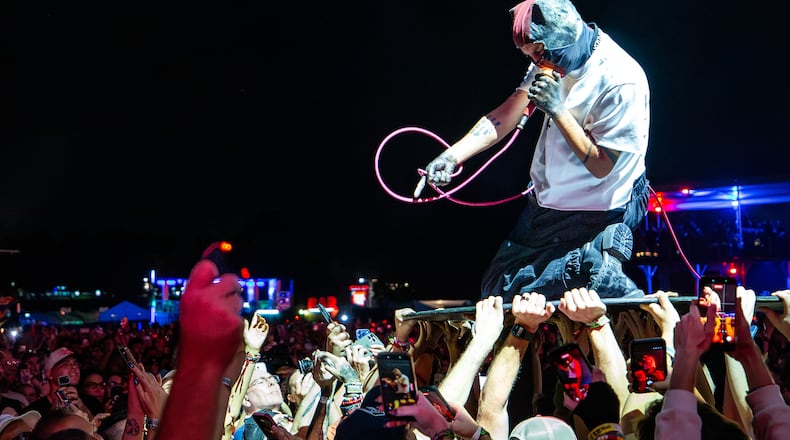 After a lengthy rain delay and evacuation, 21 Pilots closed out Saturday night at Shaky Knees with genre bending hits on the Peachtree Stage on Sept. 19, 2026, in Atlanta. (Ryan Fleisher for the AJC)