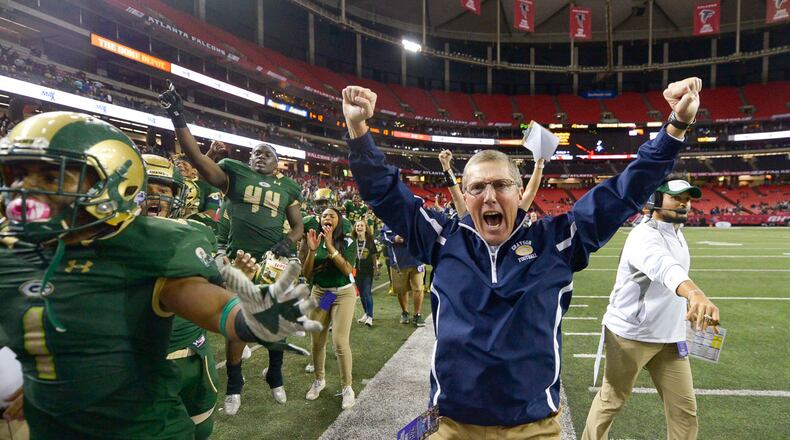 Atlanta, Ga. -- Grayson head coach Jeff Herron (center) reacts to a point scored late in the second half by the Rams during their Class AAAAAAA state title game at the Georgia Dome Saturday, December 10, 2016. SPECIAL/Daniel Varnado