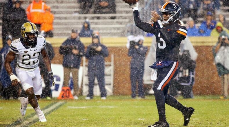 CHARLOTTESVILLE, VA - NOVEMBER 02: Bryce Perkins #3 of the Virginia Cavaliers throws a pass in the first half during a game against the Pittsburgh Panthers at Scott Stadium on November 2, 2018 in Charlottesville, Virginia. (Photo by Ryan M. Kelly/Getty Images)