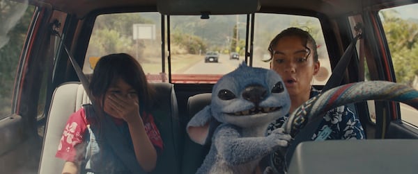 This image shows Maia Kealoha, left, and Sydney Agudong in a still from the film "Lilo & Stitch." (Walt Disney Studios Motion Pictures via AP)