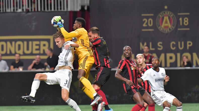 October 24, 2019 Atlanta - Philadelphia Union goalkeeper Andre Blake (18) catches over Philadelphia Union defender Jack Elliott (3) as Atlanta United defender Leandro Gonzalez (5) approaches in the first half during Eastern Conference semifinals of MLS playoffs at Mercedes-Benz Stadium on Thursday, October 24, 2019. (Hyosub Shin / Hyosub.Shin@ajc.com)